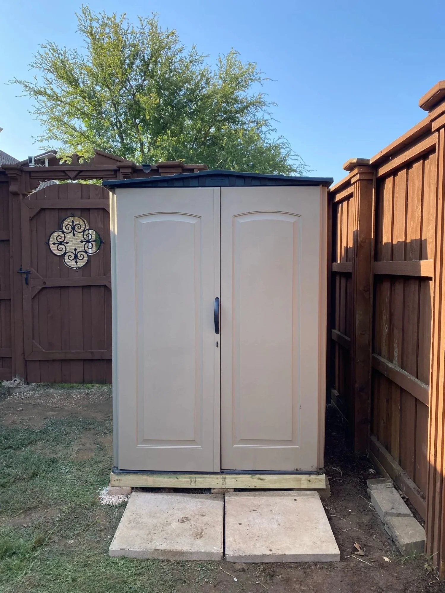 Assembled storage shed with doors closed
