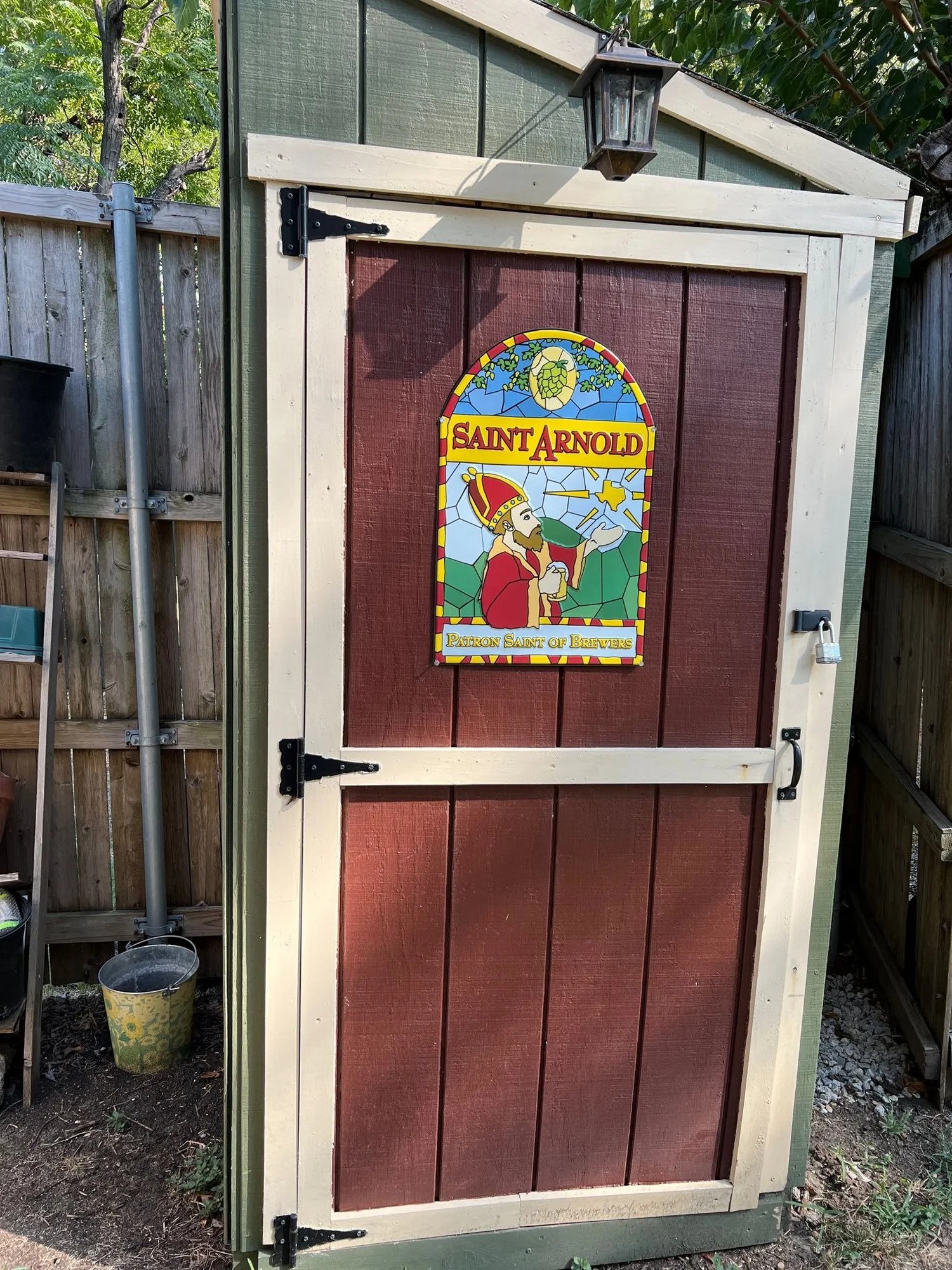 Completed custom shed with paint and hardware
