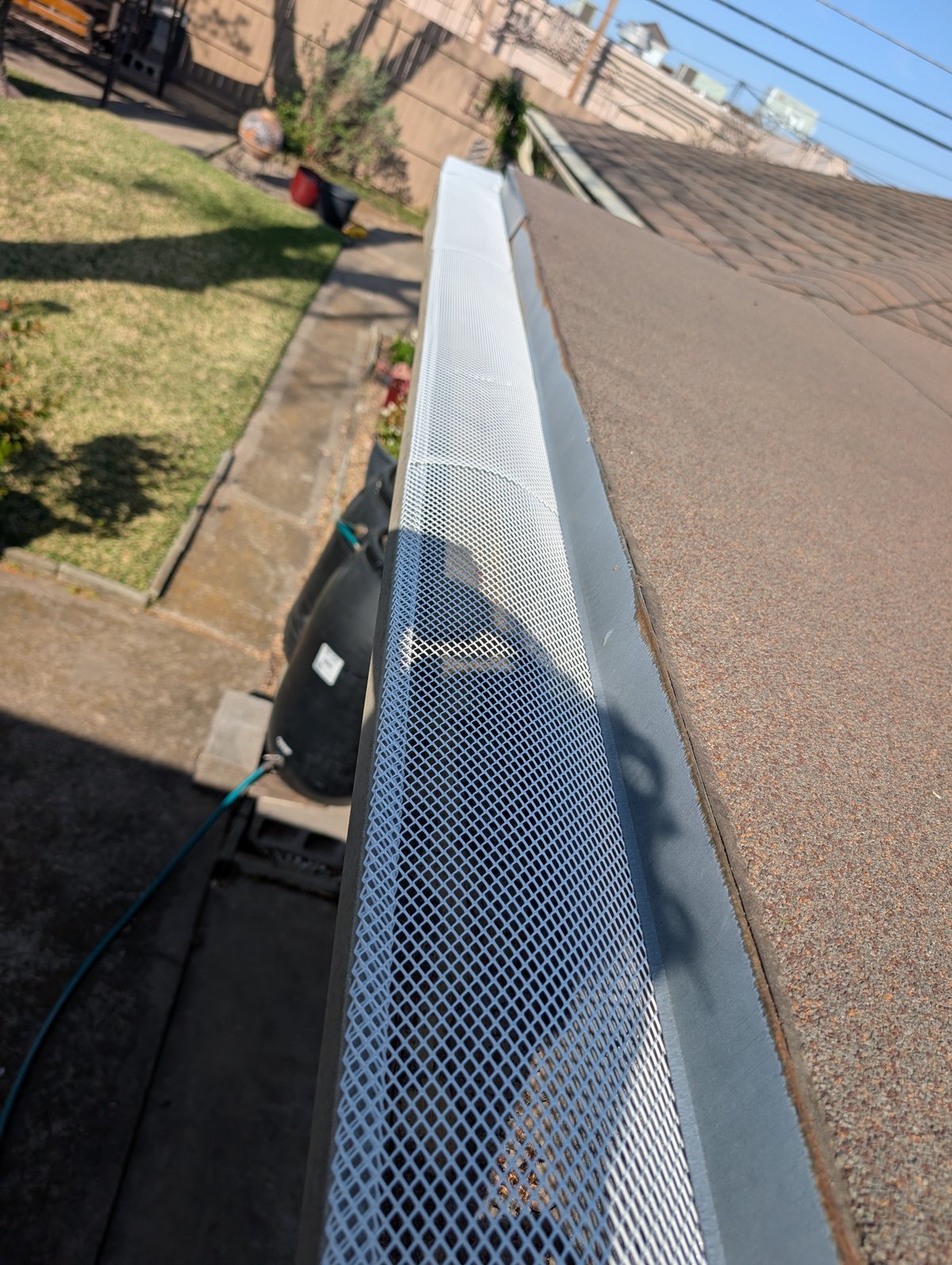 Gutter guards installed on DFW home to prevent debris buildup